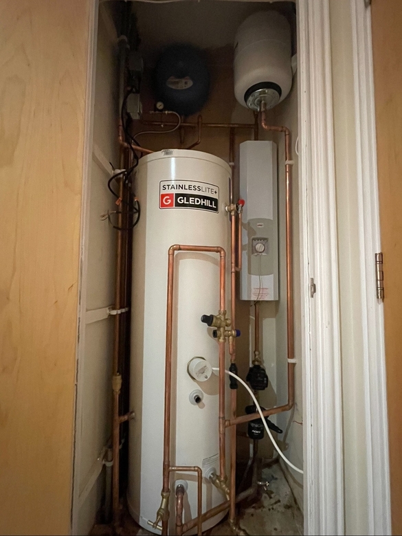 Electric boiler installation in London with professional wiring and commissioning